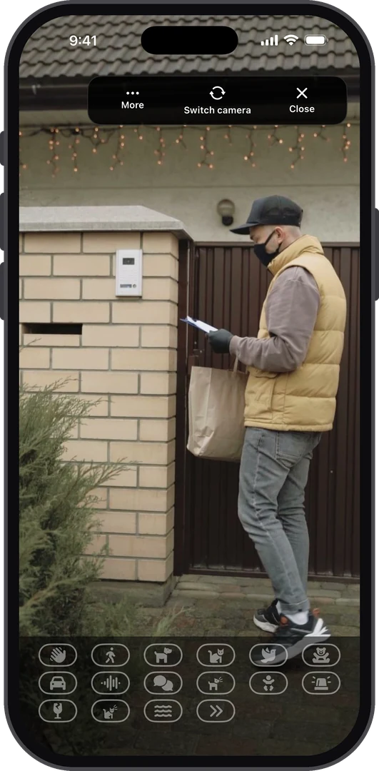 AiCam camera watching a person at the front gate